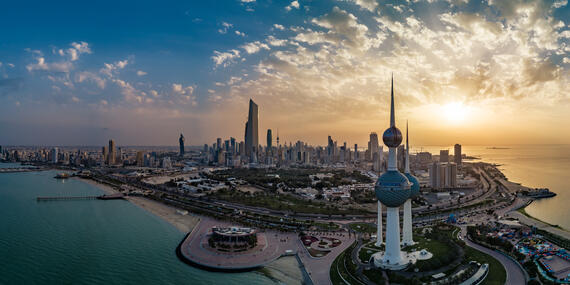 Cityscape of Kuwait City at dusk