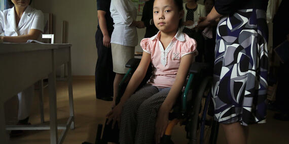 A girl in a wheelchair in Pyongyang