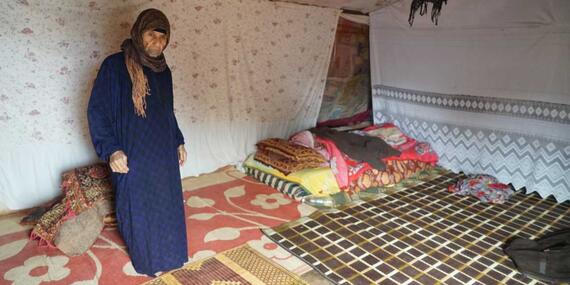 80-year-old displaced woman living with her sick husband in north-west Syria