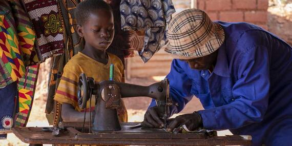 Disabled man sewing in Central African Republic