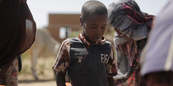 A boy near a water point in Darfur region.