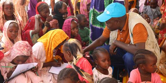 Child Protection Officer with UNICEF Chad with children