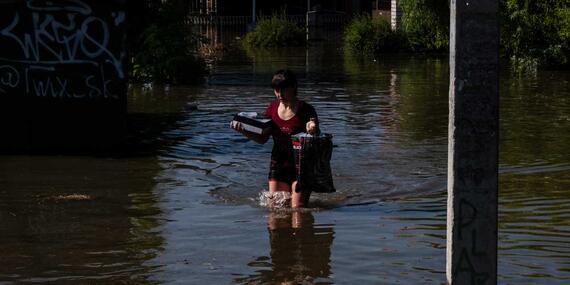 Woman wading through water