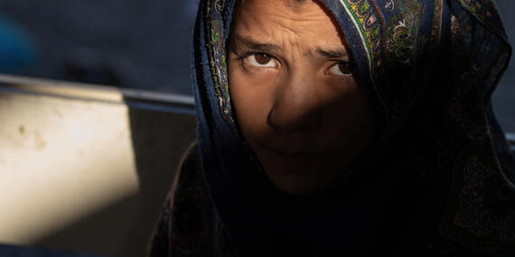 An Afghan woman gazing into the camera, Afghanistan