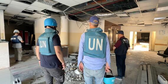 UN mission to northern Gaza inspecting a damaged building.