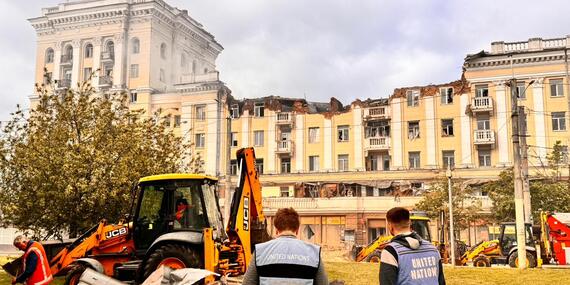 UN staff inspect damaged residential areas in Dnipro, Ukraine, after an attack left civilians, including children, injured and civilian infrastructure compromised
