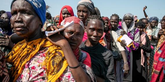 Women line up for humanitarian assistance in Renk, South Sudan