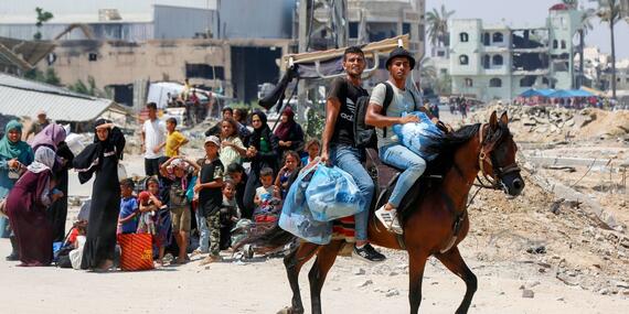 Palestinian families on the move in response to the latest evacuation orders from the Israeli military