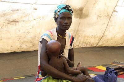 A mother and child at a nutrition centre’s waiting area in Pibor town, South Sudan. June 2021.