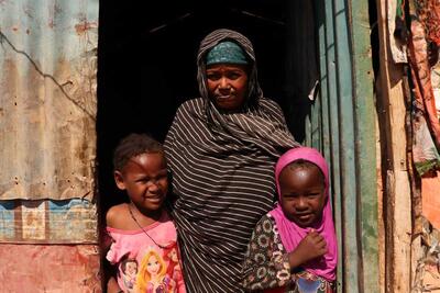 Displaced by drought, Halima and her daughters live in a shelter 