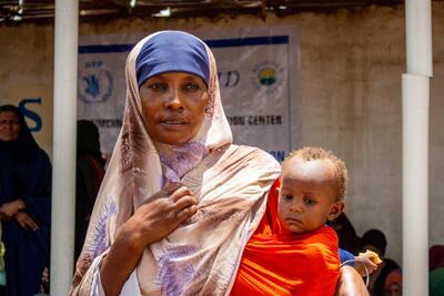 A mother with her baby at the Saacid Nutrition Facility in Jowhar, Somalia. 