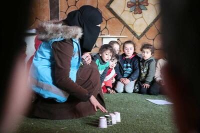 Walaa’ Al-Zaitoon helps children in Idleb, north-west Syria 