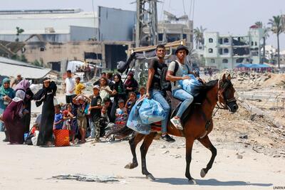 Palestinian families on the move in response to the latest evacuation orders from the Israeli military