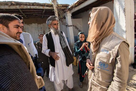 An OCHA staff member engages with the community in Kandahar Province
