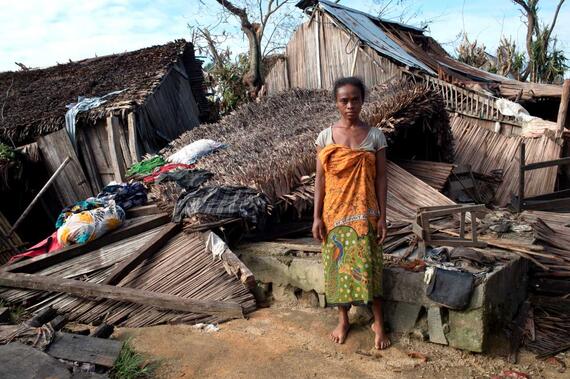 A girl in front of her home in Madagascar destroyed by Cyclone Batsirai