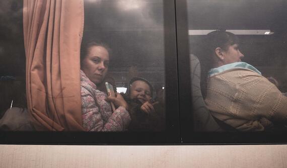A women and child on board a bus