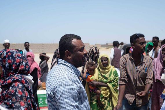 Mussab with his team providing assistance to affected people in Port Sudan. 