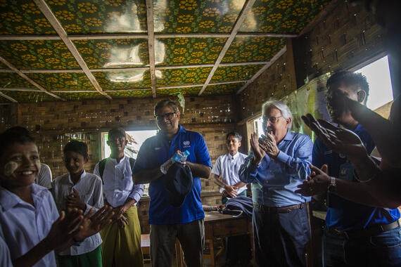 Under-Secretary-General for Humanitarian Affairs and Emergency Relief Coordinator Martin Griffiths (second from right) and OCHA’s Head of Office in Myanmar, Sajjad Said (centre), meet Rohingya students at a site for displaced people in Sittwe, Rakhine, Myanmar