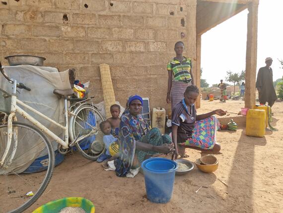 A displaced family, under the shade, in the school where they have temporarily taken shelter. Burkina Faso,