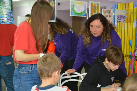 Iryna participates in an art therapy session with displaced and war-affected children. 