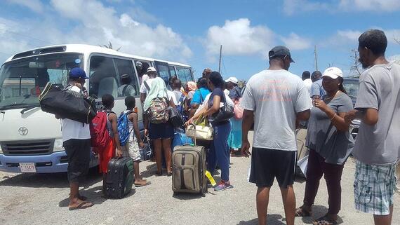 People being evacuated in the aftermath of Hurricane Irma, which wreaked havoc in Antigua and Barbuda and other Caribbean islands in 2017