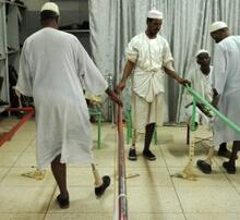 2009, Khartoum, Sudan: In this file photo, men learn to walk with prosthetic legs at a clinic in Khartoum. Communities in conflict-affected parts of Sudan face a continued threat from landmines and other pieces of unexploded ordnance. 