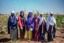 FAO Deputy Director-General, Beth Bechdol, (2nd from the left) and OCHA Assistant Secretary-General for Humanitarian Affairs and Deputy Emergency Relief Coordinator, Joyce Msuya (4th from the left), meeting rural women during their field visit in Somalia.